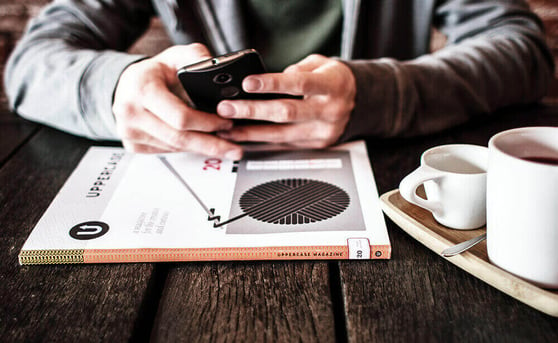 man-phone-coffee-table